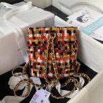 CHANEL 23A Quilted Chain Backpack in Wool Tweed