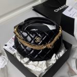 CHANEL Quilted Round Mini Black Top Handle Bag in Calfskin