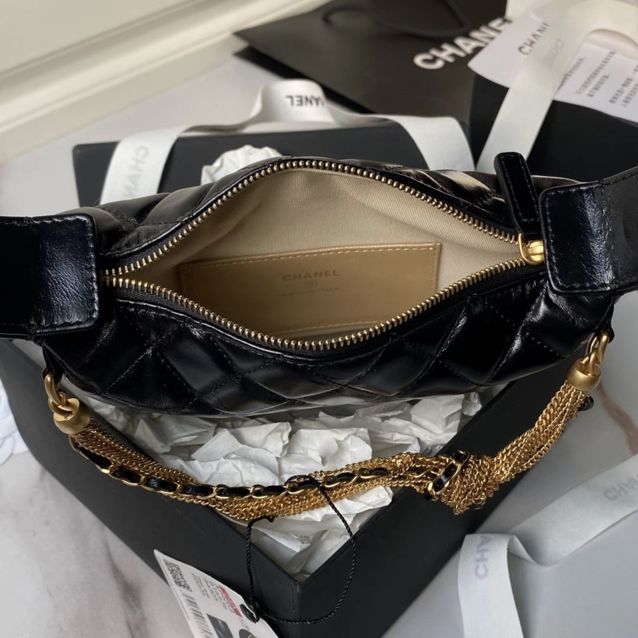 CHANEL Quilted Round Mini Black Top Handle Bag in Calfskin