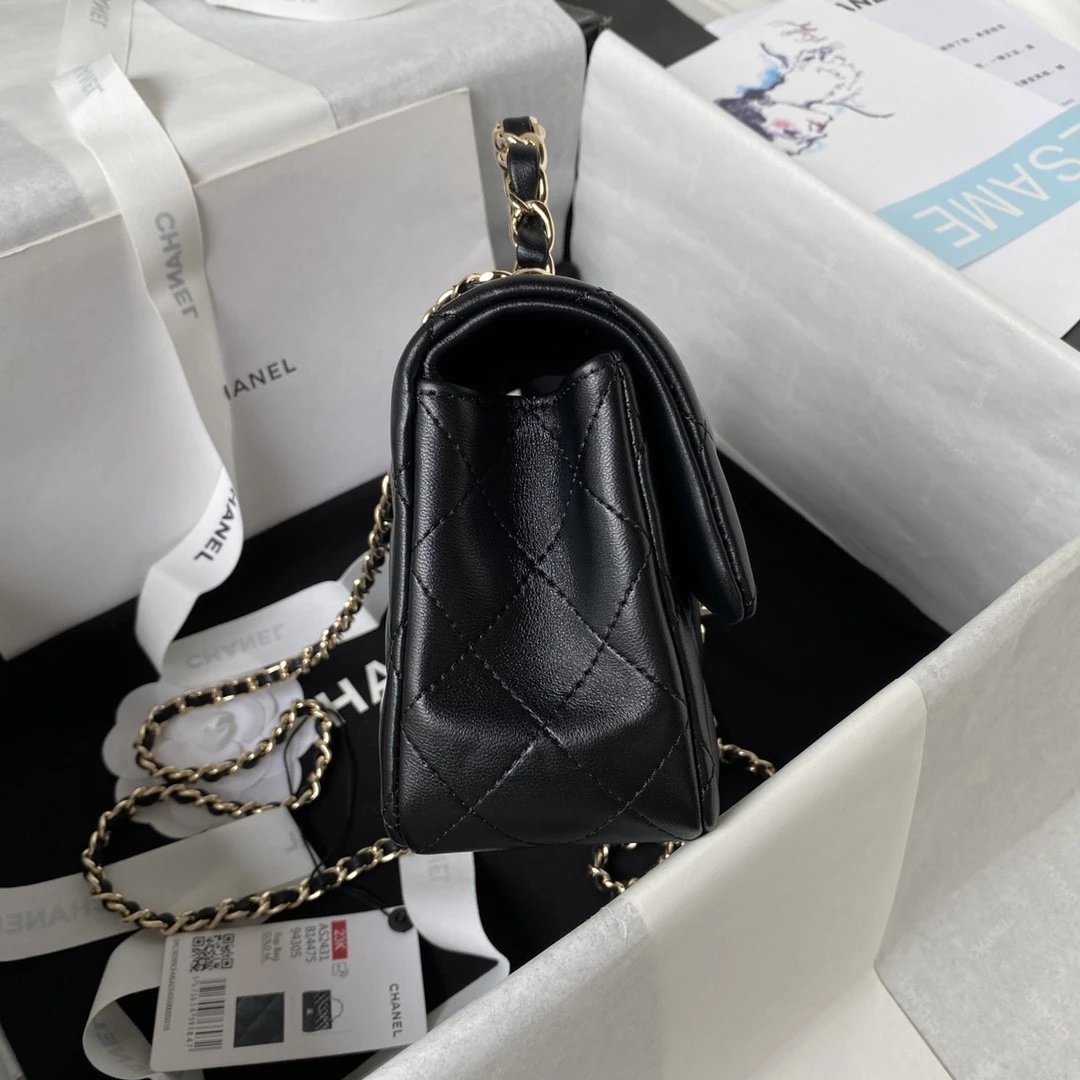 CHANEL Logo Handle bag in Lambskin