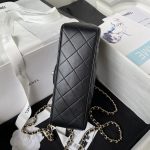 CHANEL Logo Handle bag in Lambskin