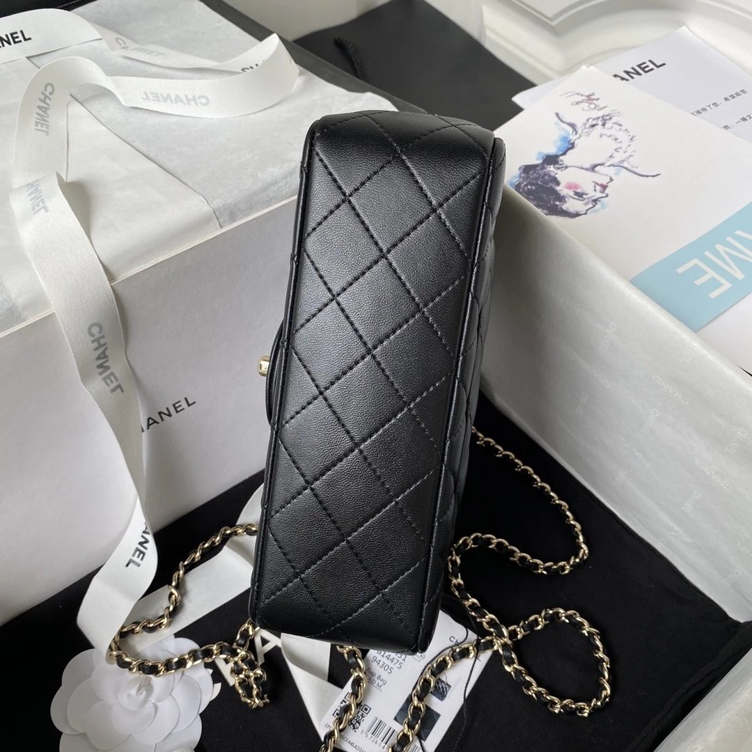 CHANEL Logo Handle bag in Lambskin