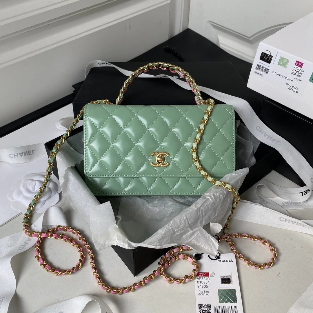 CHANEL Quilted Lambskin Flap Bag with Perforated Metal Letter Handle and Leather-Interwoven Chain