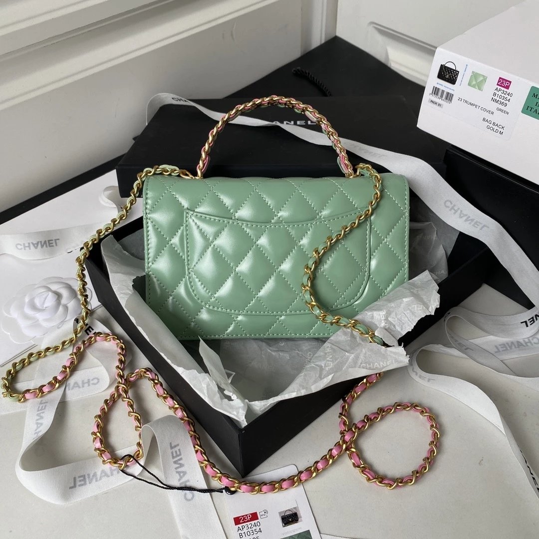CHANEL Quilted Lambskin Flap Bag with Perforated Metal Letter Handle and Leather-Interwoven Chain