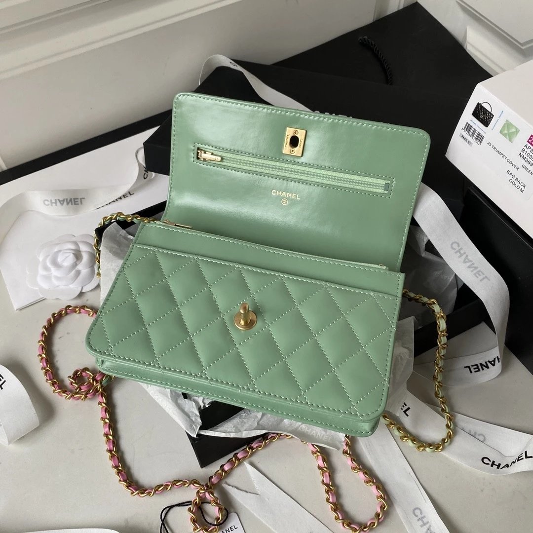 CHANEL Quilted Lambskin Flap Bag with Perforated Metal Letter Handle and Leather-Interwoven Chain