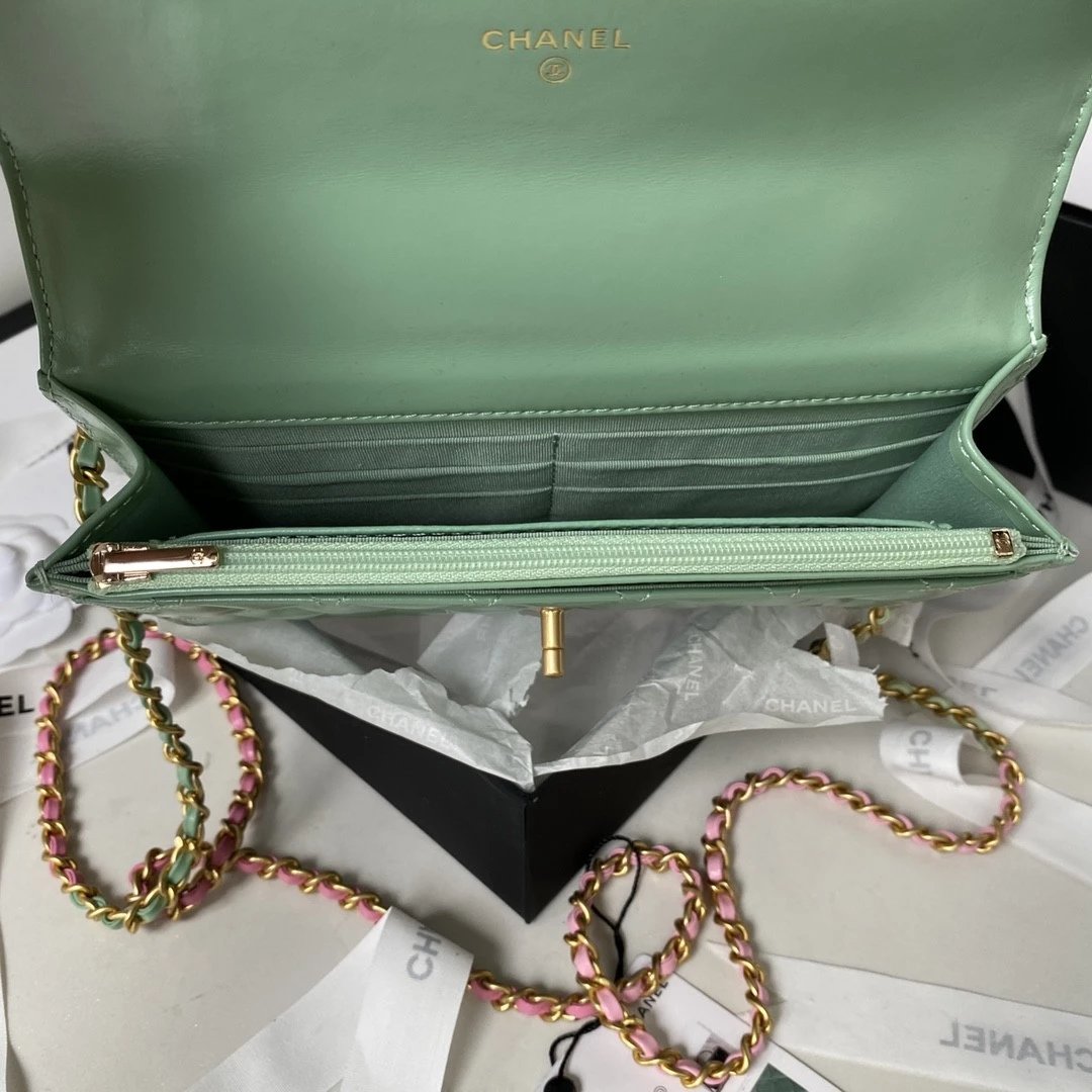 CHANEL Quilted Lambskin Flap Bag with Perforated Metal Letter Handle and Leather-Interwoven Chain