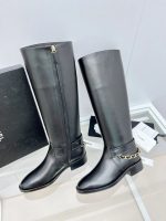 CHANEL riding boots with CC and chain at back