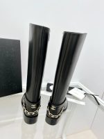 CHANEL riding boots with CC and chain at back