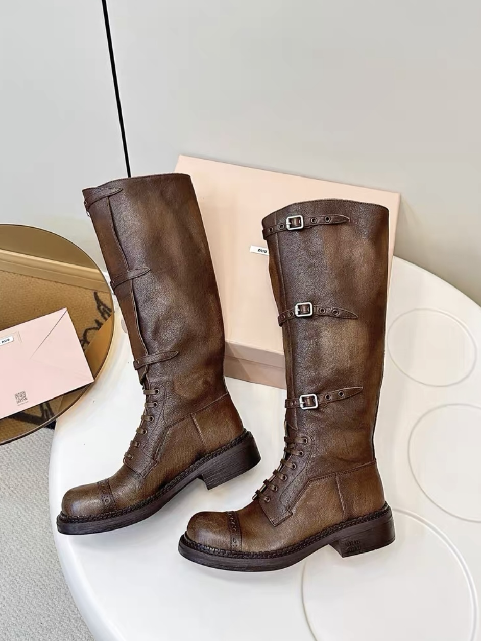 MIUMIU ace-up leather boots