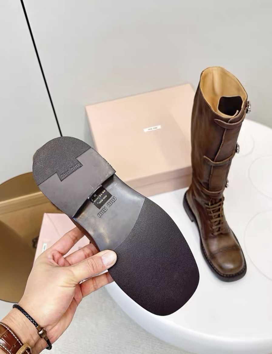 MIUMIU ace-up leather boots
