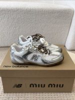 MIUMIU NB 530 SL metallic leather and mesh sneakers