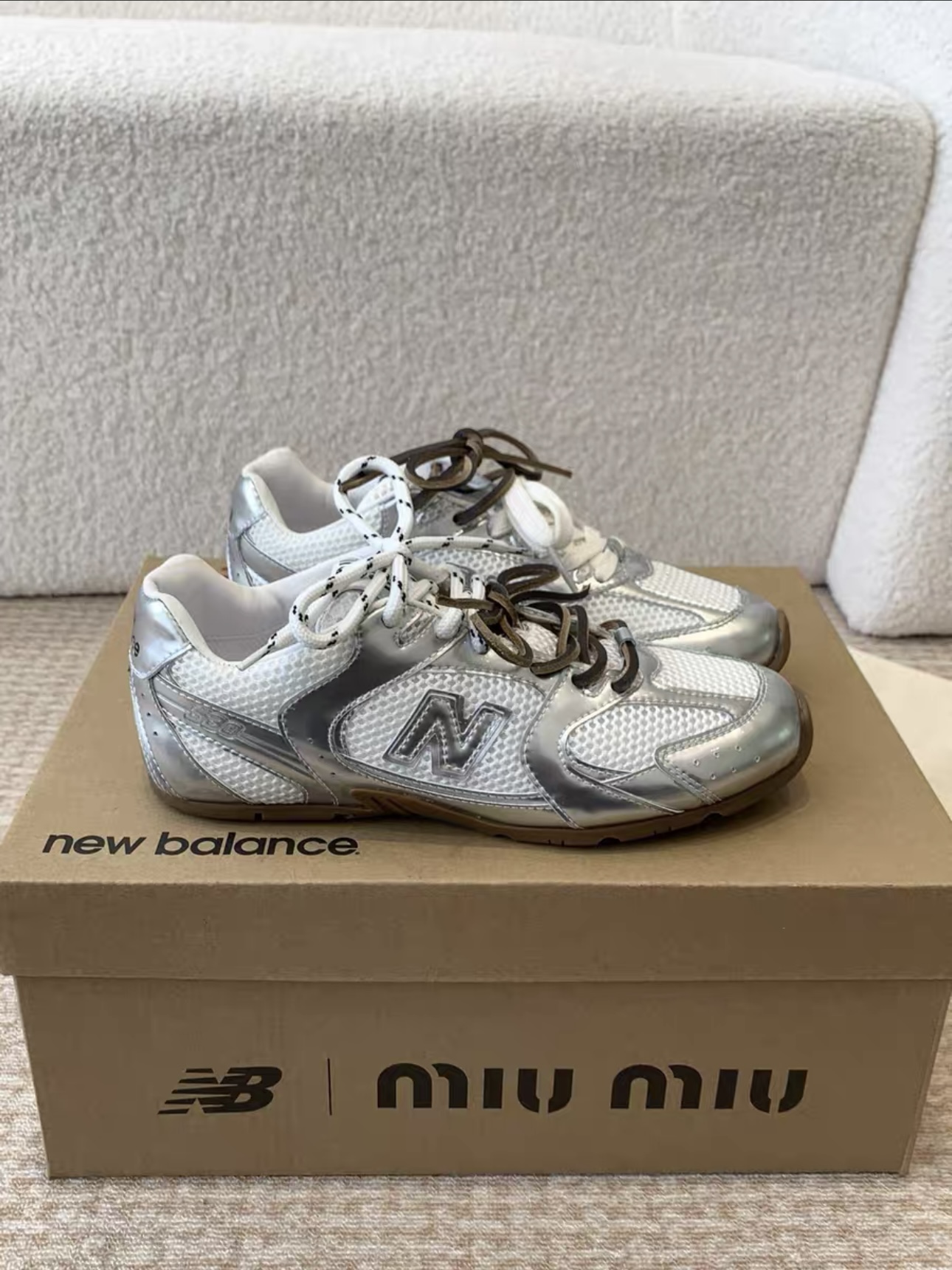 MIUMIU NB 530 SL metallic leather and mesh sneakers