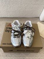 MIUMIU NB 530 SL metallic leather and mesh sneakers
