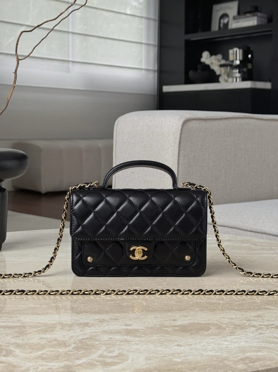 CHANEL Clutch with chain